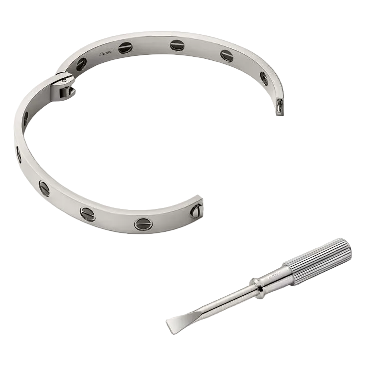Silver bracelet with tool on a light gray background