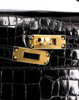 Hermès Kelly Pochette Crocodile.