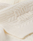 Miu Miu cable-knit cashmere throw.