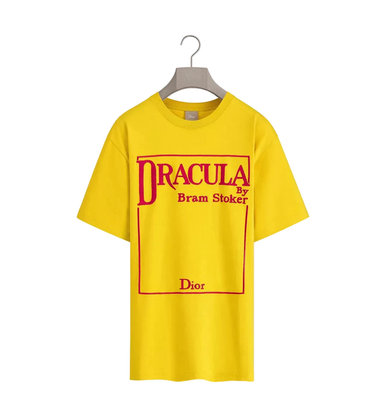 Yellow t-shirt with 'Dracula by Bram Stoker' and 'Dior' text on a hanger against a white background