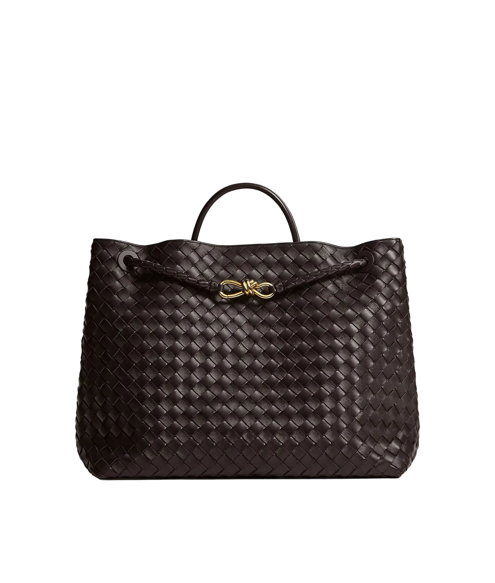 Brown woven handbag with a gold bow on a light gray background