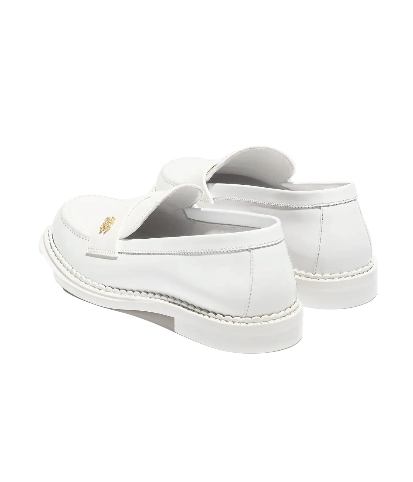 White loafers with a brand logo on a white background