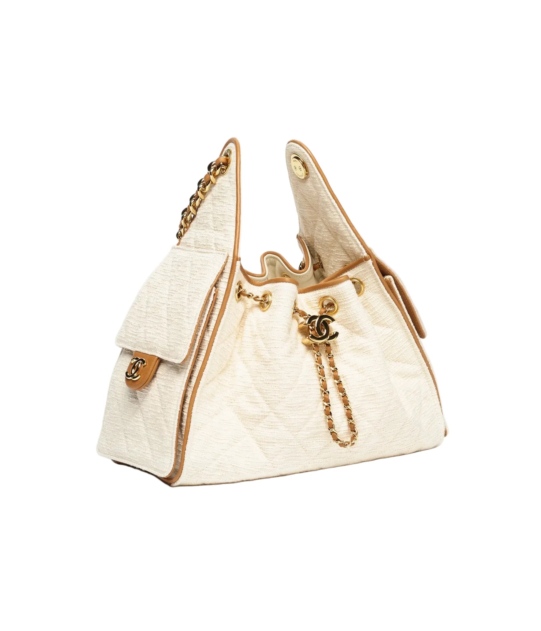 White handbag with gold accents on a white background