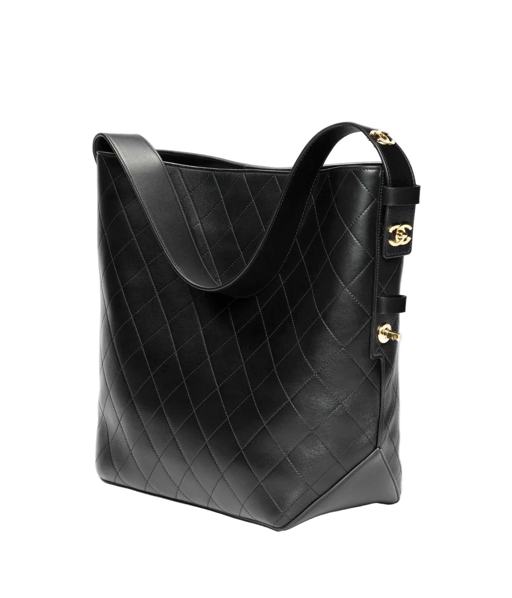 Black quilted handbag with gold hardware on a white background