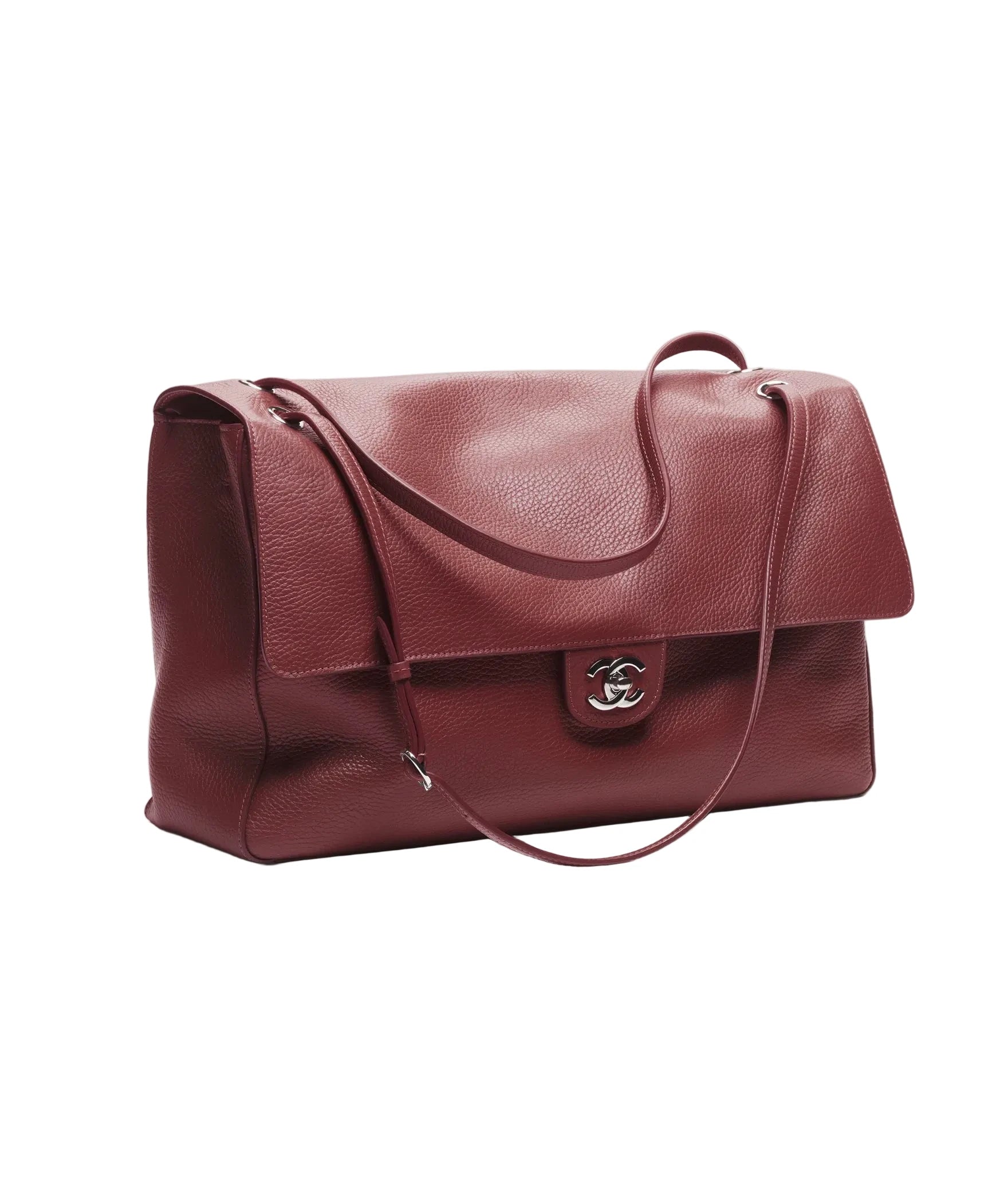 Brown leather handbag with a visible brand logo on a white background