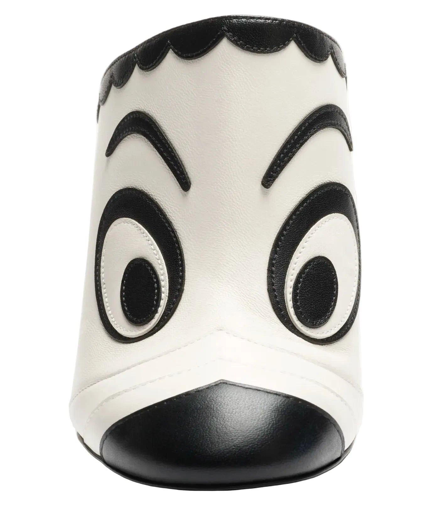 White sandal with black accents shaped like a face on a white background