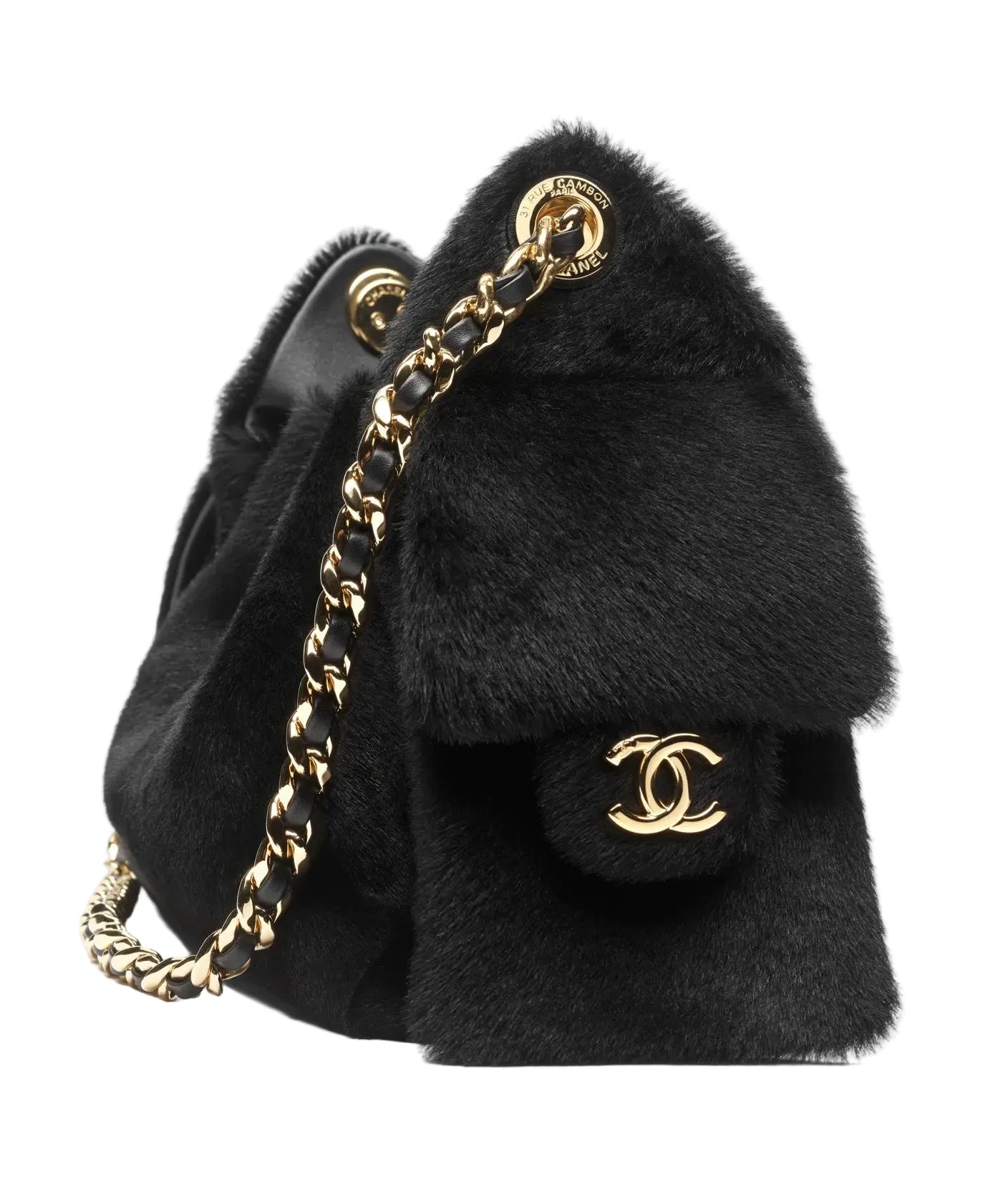 Black fluffy bag with gold chain and Chanel logo on a white background