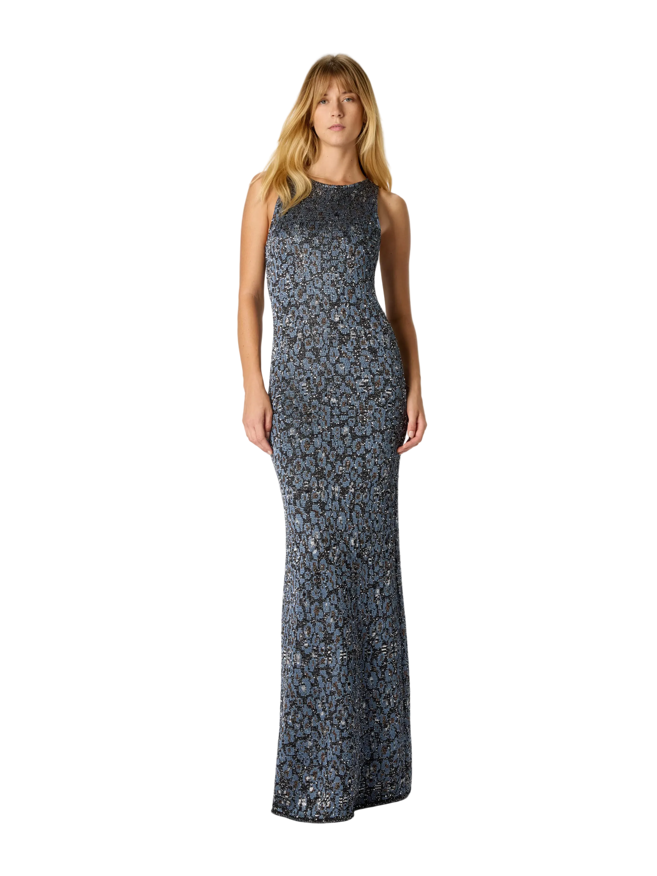 Woman wearing a long floral dress on a white background