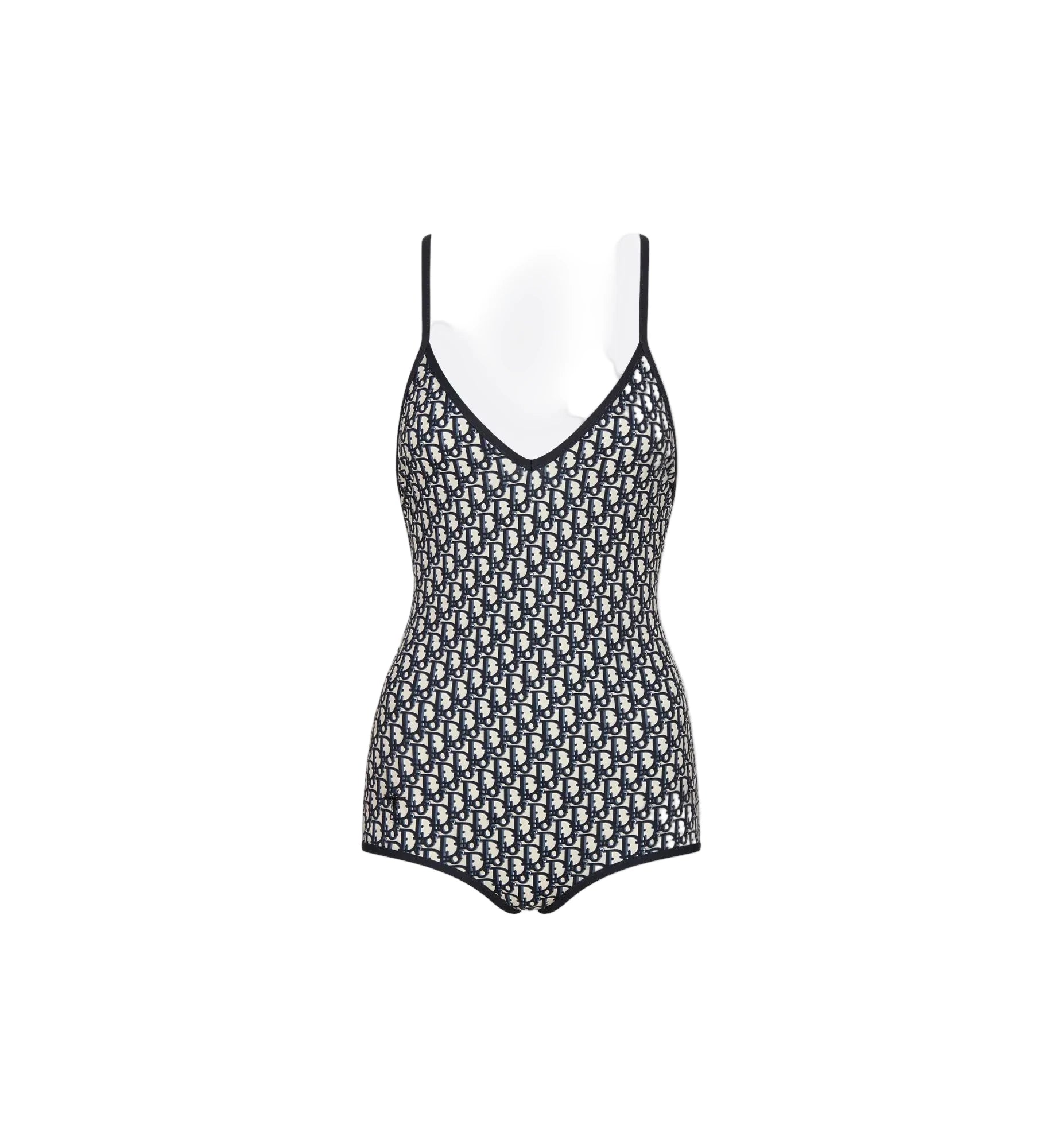 Black and white patterned swimsuit on a light gray background