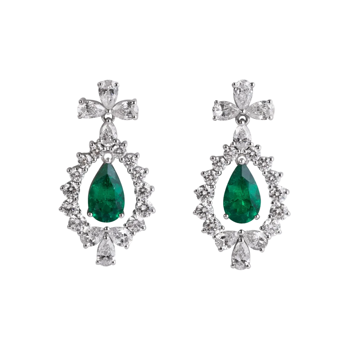 Pair of earrings with green gemstones and diamond-like stones on a white background