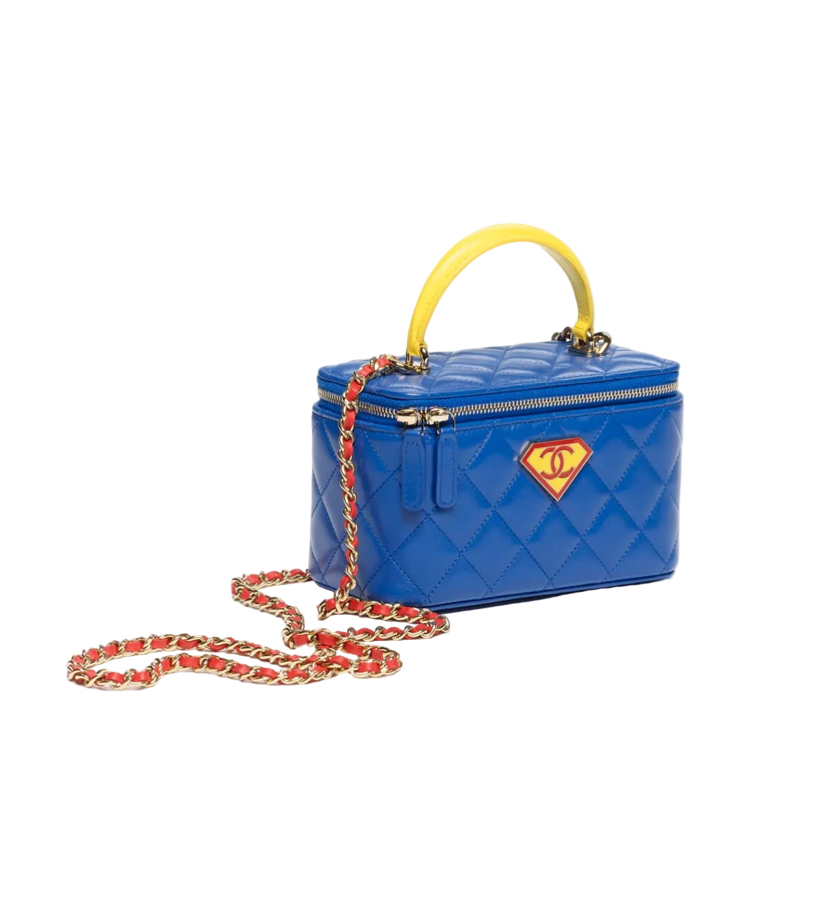 Blue quilted handbag with yellow handle and Superman logo on a white background