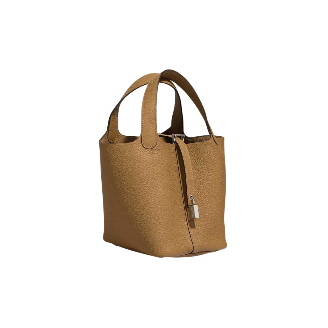 Tan handbag on a light gray background