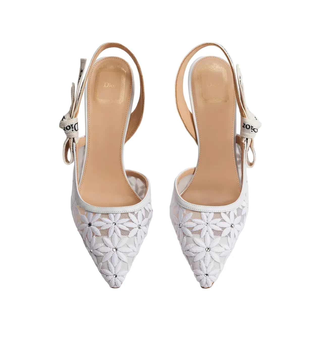 A pair of white pointed-toe slingback heels with floral lace-up embroidery and rhinestone embellishments, shown from a top-down view on a light gray background.