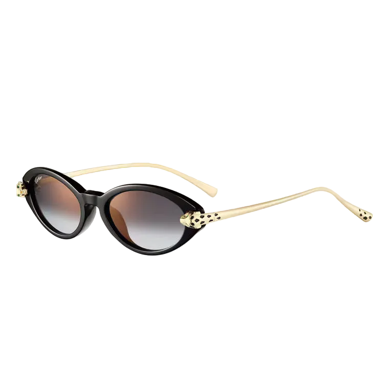 Sunglasses with black lenses and gold frames on a light gray background