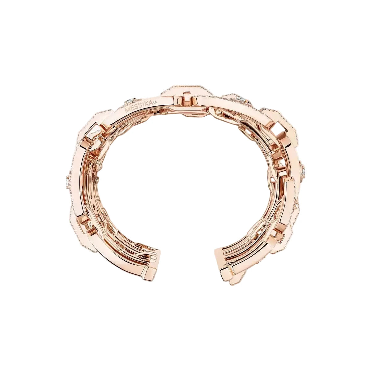 Rose gold ring with intricate design on a white background