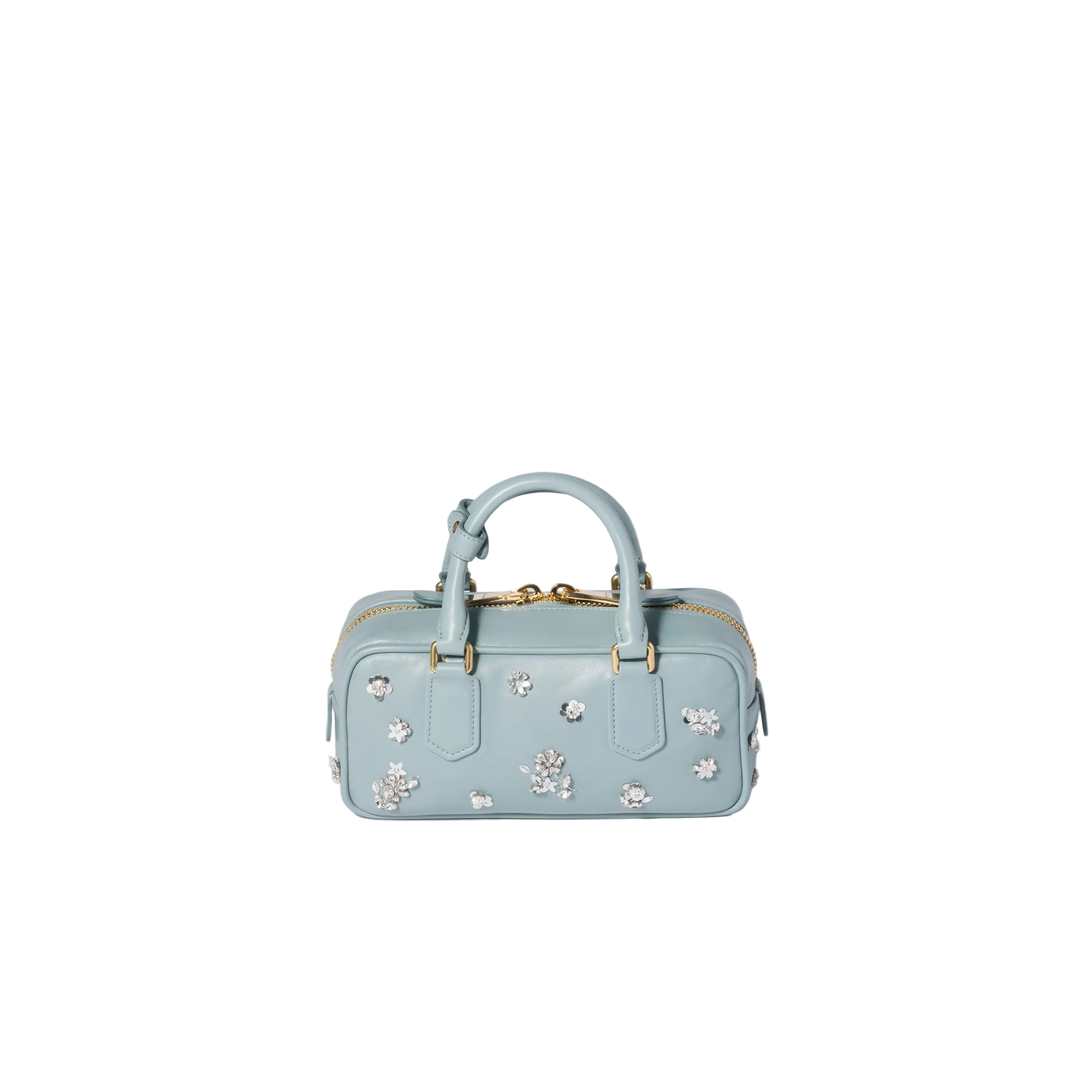 A light blue leather top-handle satchel bag embellished with silver floral appliqués and gold-tone hardware, shown against a solid light beige background.