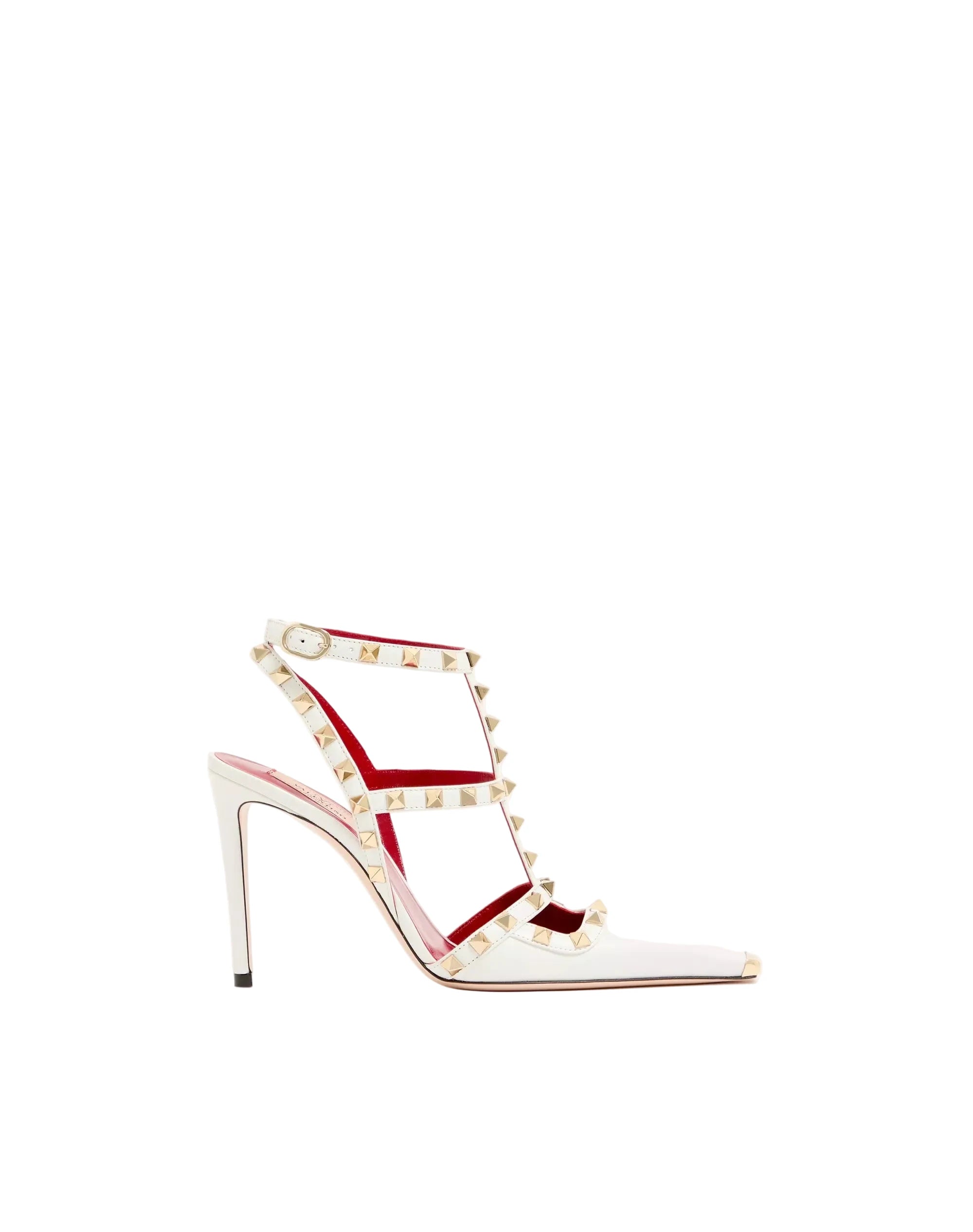 High-heeled shoe with studded design on a white background