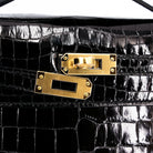 Hermès Kelly Pochette Crocodile.