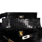 Hermès Kelly Pochette Crocodile.