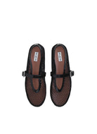 Alaïa fishnet ballet flats.