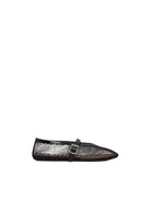 Alaïa fishnet ballet flats.
