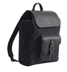 Black backpack with a pattern on a light gray background
