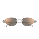Sunglasses with gold gradient lenses and silver frame on a white background