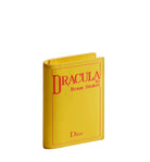 Yellow book-shaped wallet with 'Dracula' by Bram Stoker design on a white background