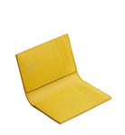 Yellow wallet on a light gray background