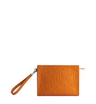 An orange embossed leather wristlet clutch with a matching wrist strap and a silver-tone metal clasp, shown on a plain light gray background.