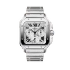 Silver Cartier watch on a light beige background