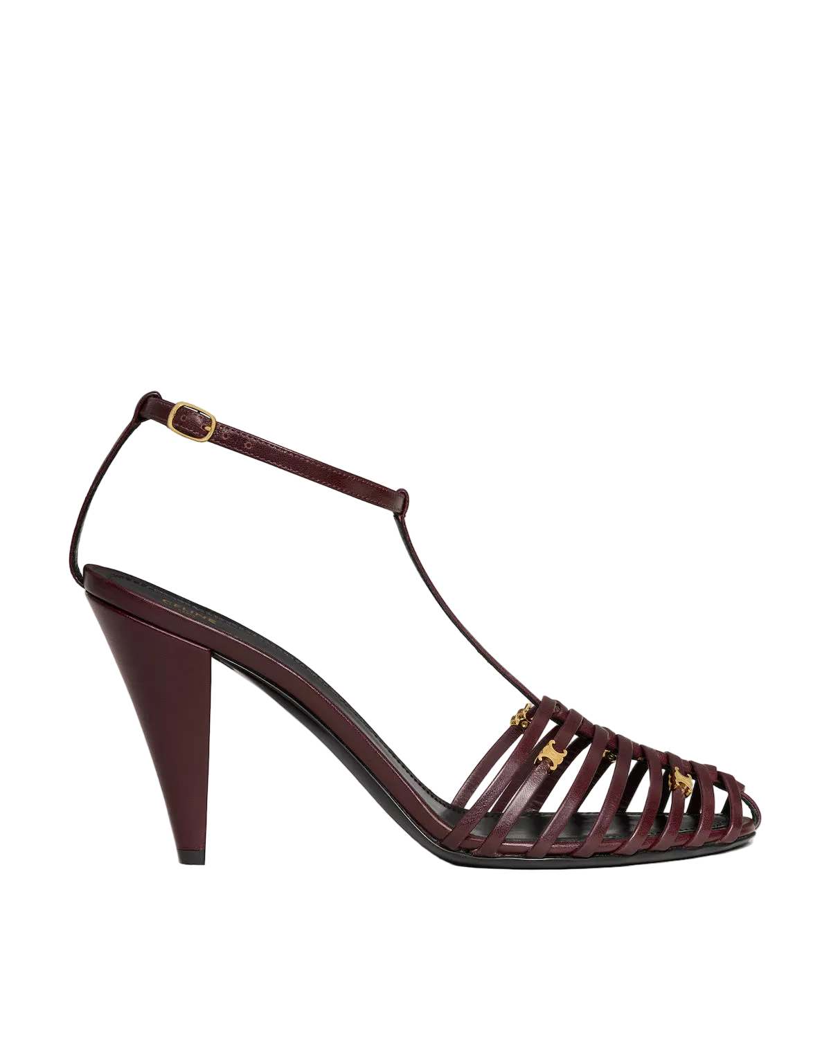 A single dark burgundy leather strappy sandal with a high conical heel and gold-tone hardware, shown from a side profile on a light gray background.