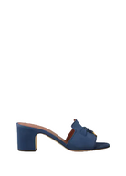 Blue sandal with a block heel on a white background