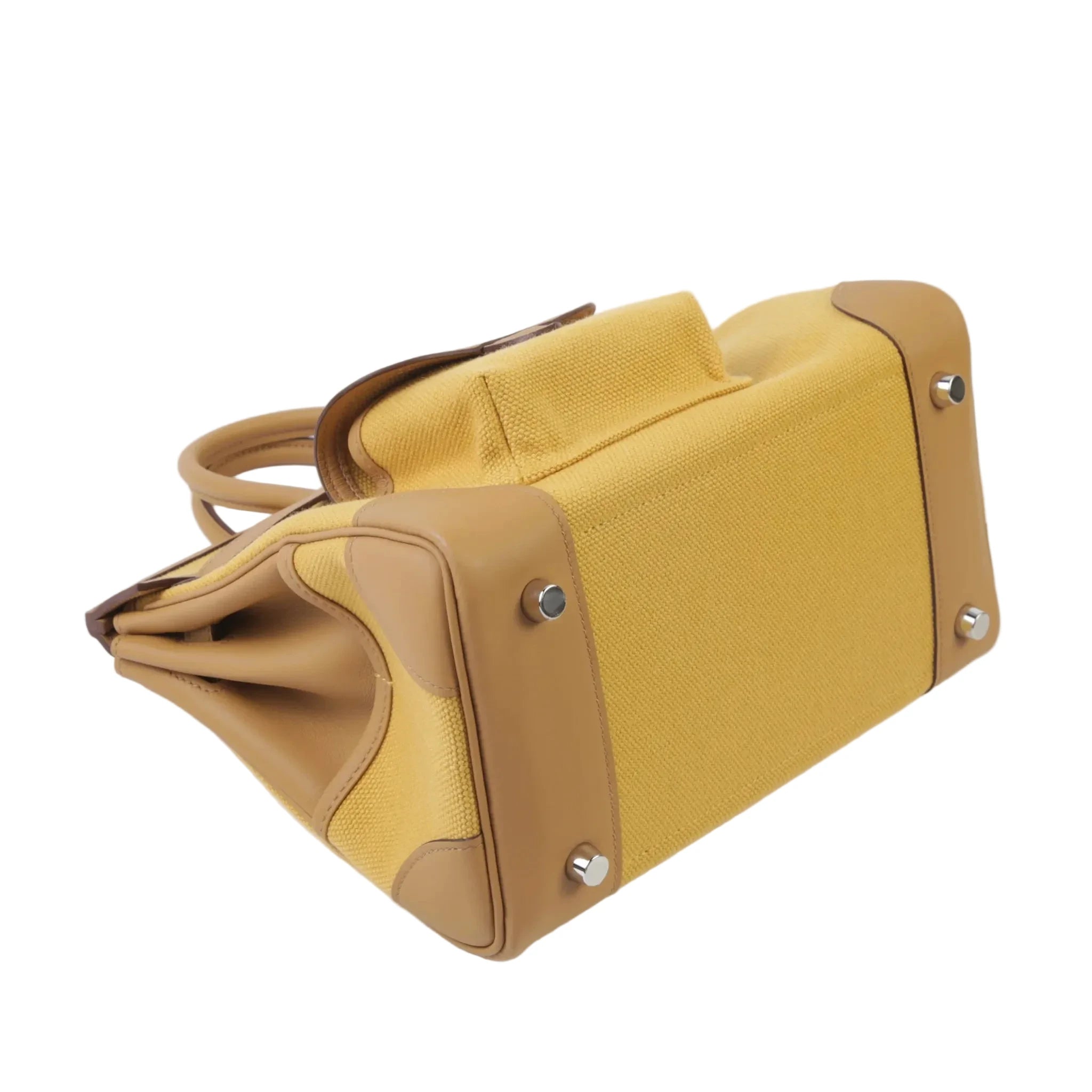 Yellow handbag with brown accents on a white background
