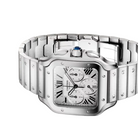 Silver Cartier watch on a light gray background