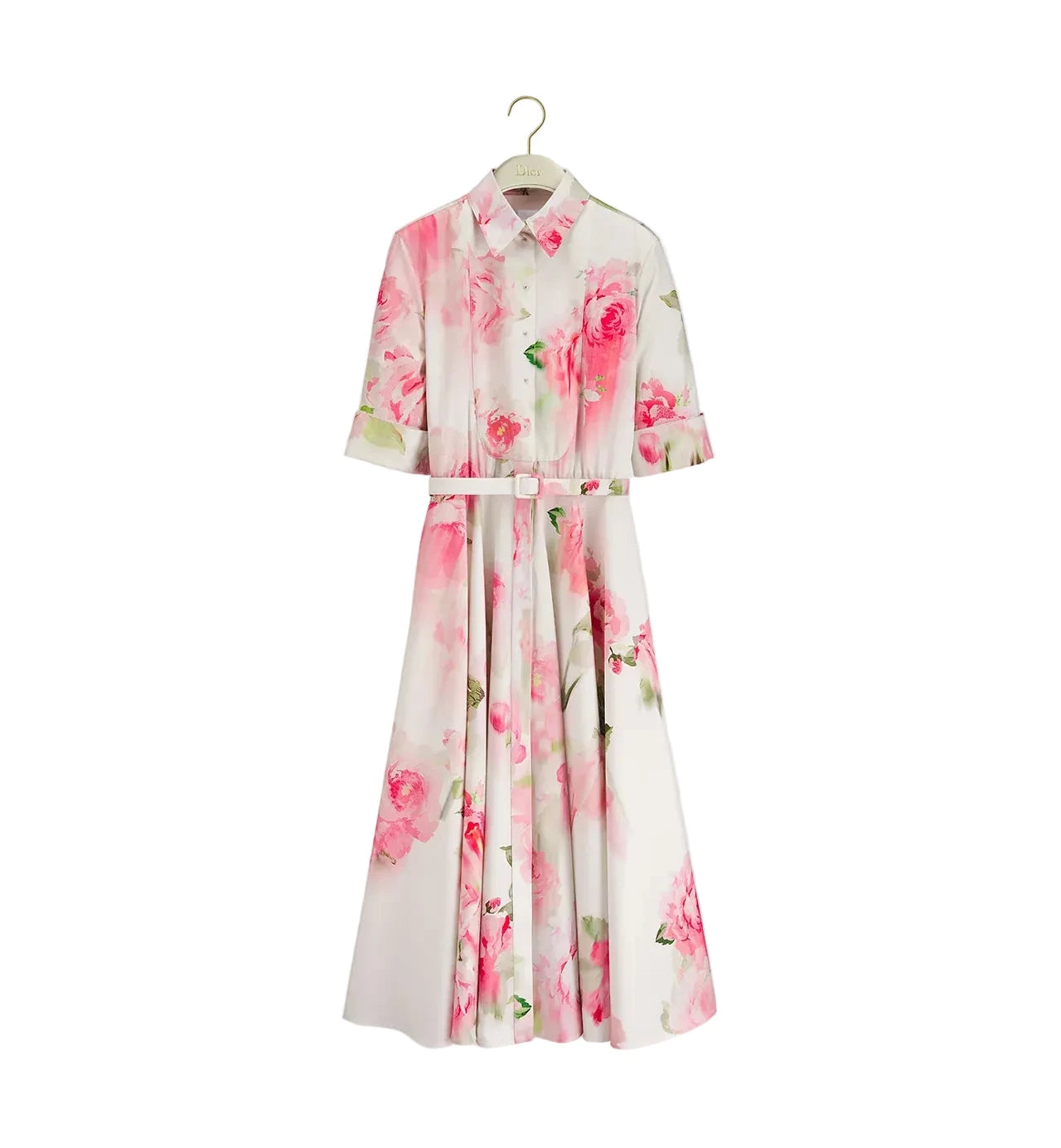 Floral dress on a hanger against a white background