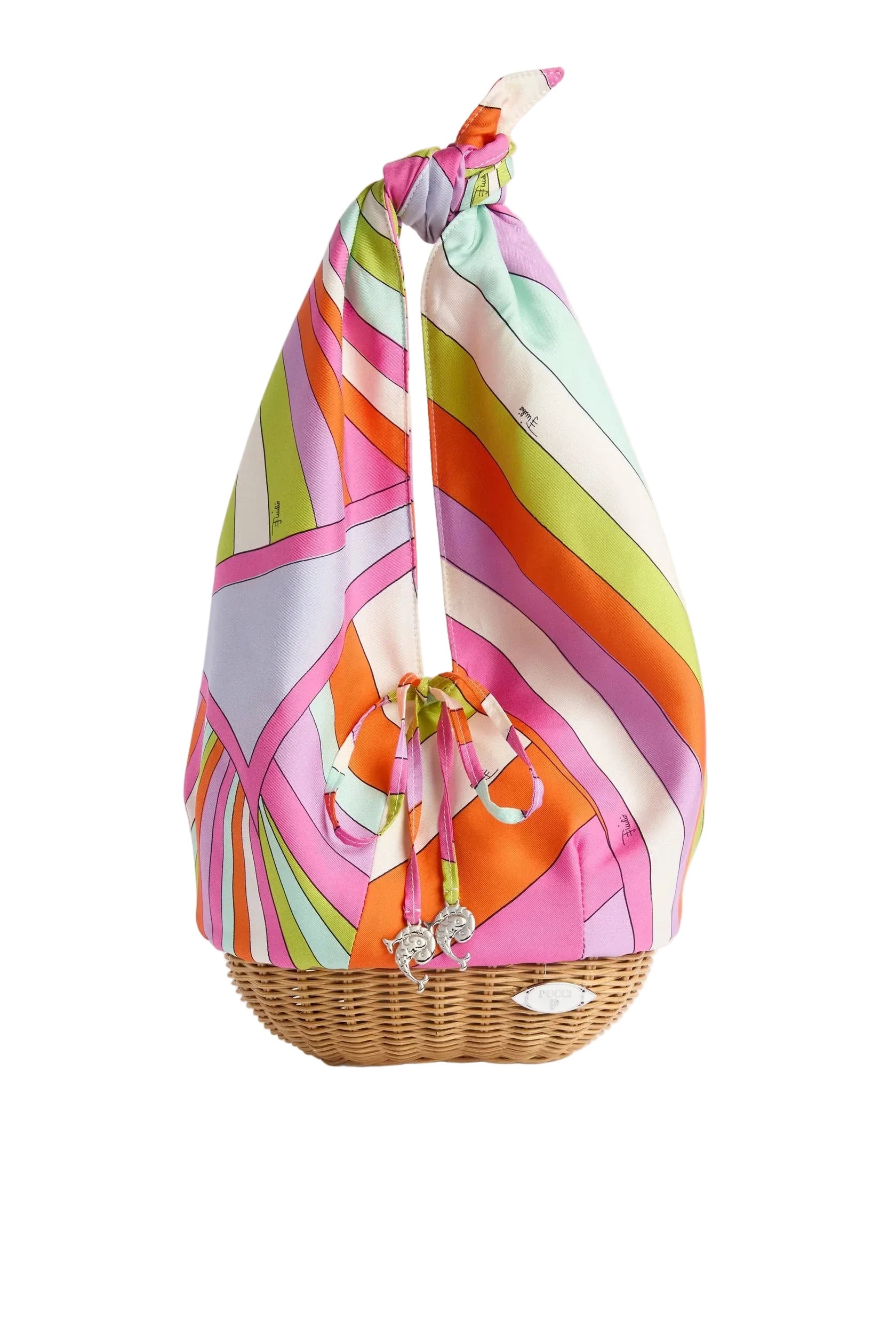 Colorful patterned bag tied over a wicker basket on a white background