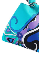 Colorful handbag with abstract design and Prada logo on a white background