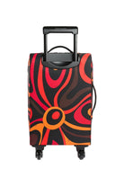 Colorful suitcase with a black handle on a light gray background