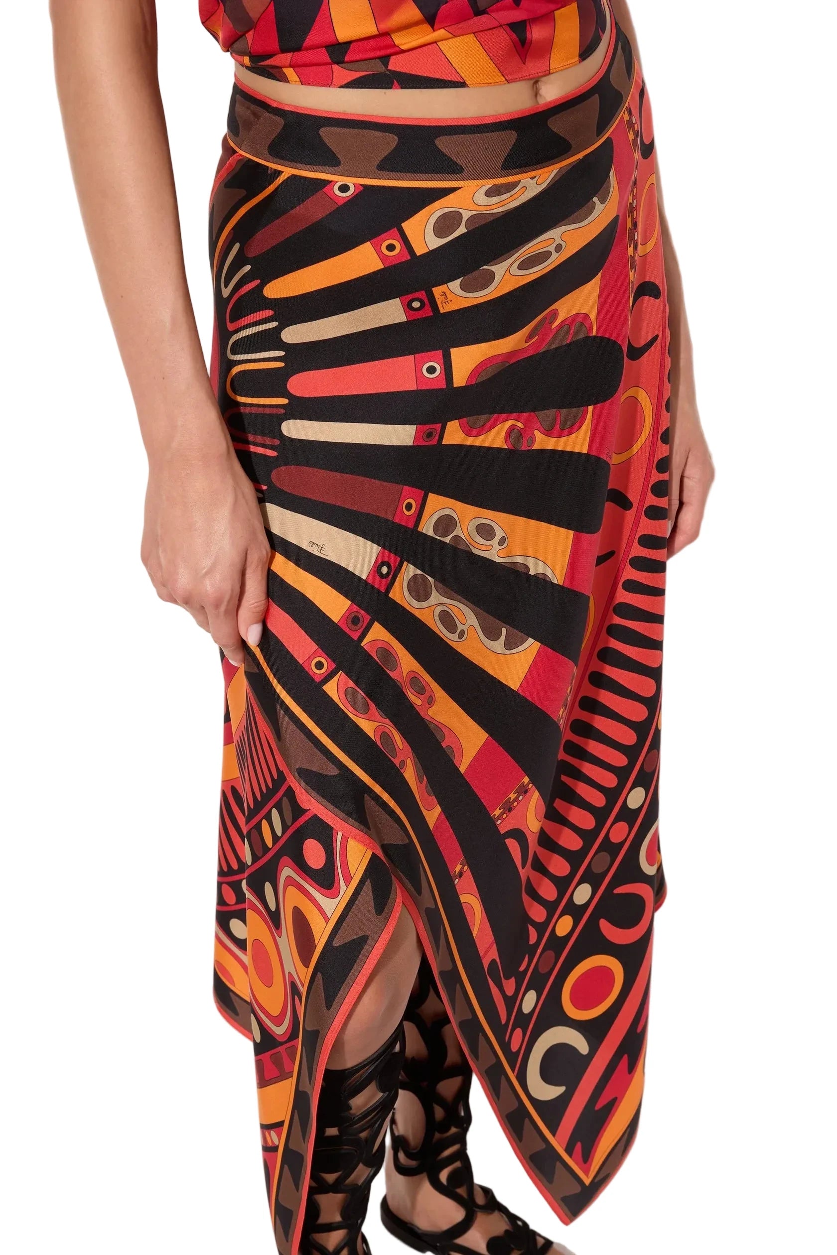 Colorful patterned skirt with a plain background