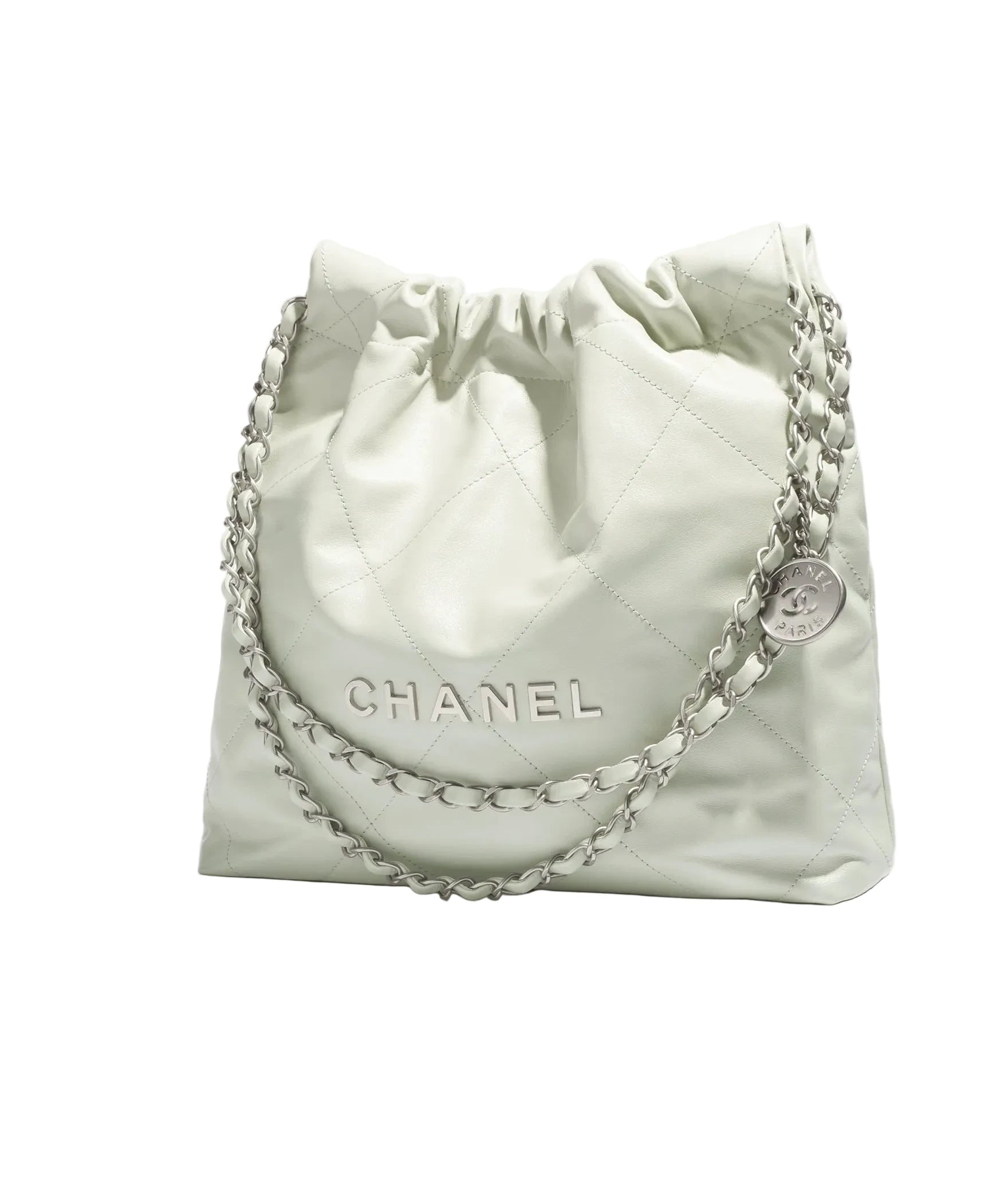 Light green quilted Chanel bag with chain detail on a white background