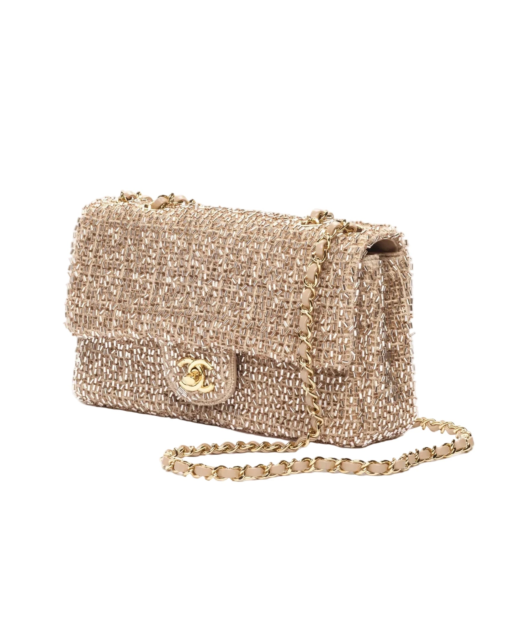 Gold textured handbag with chain strap on a white background