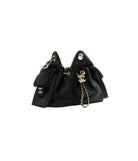 Black handbag with gold hardware on a white background