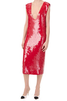 Red sequin dress on a white background