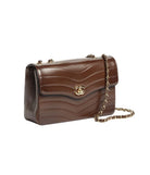 A dark brown quilted leather handbag with a wavy texture, a gold-tone interlocking G logo on the front flap, and a gold chain strap, shown on a plain white background.