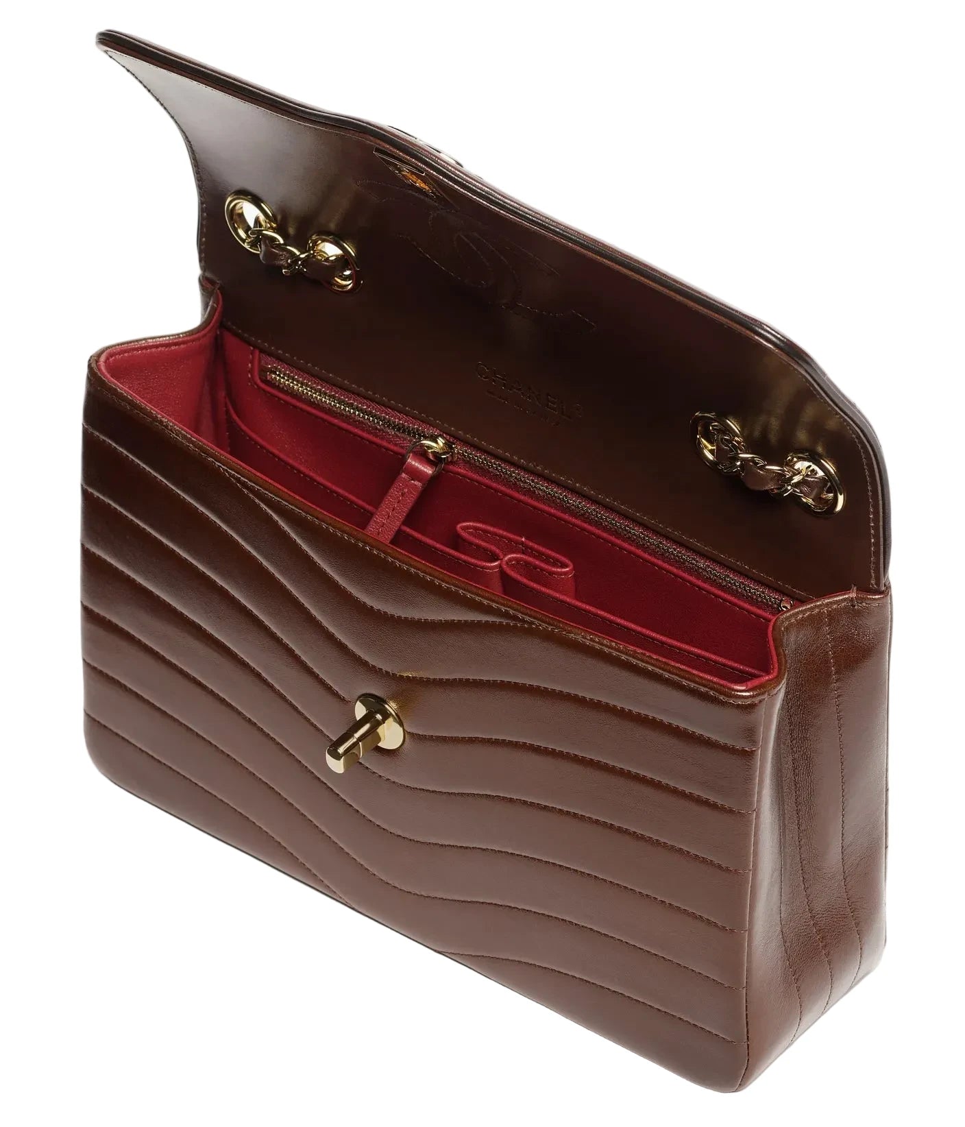 A brown quilted leather handbag with a deep red interior lining and gold-tone hardware, shown open against a plain white background.