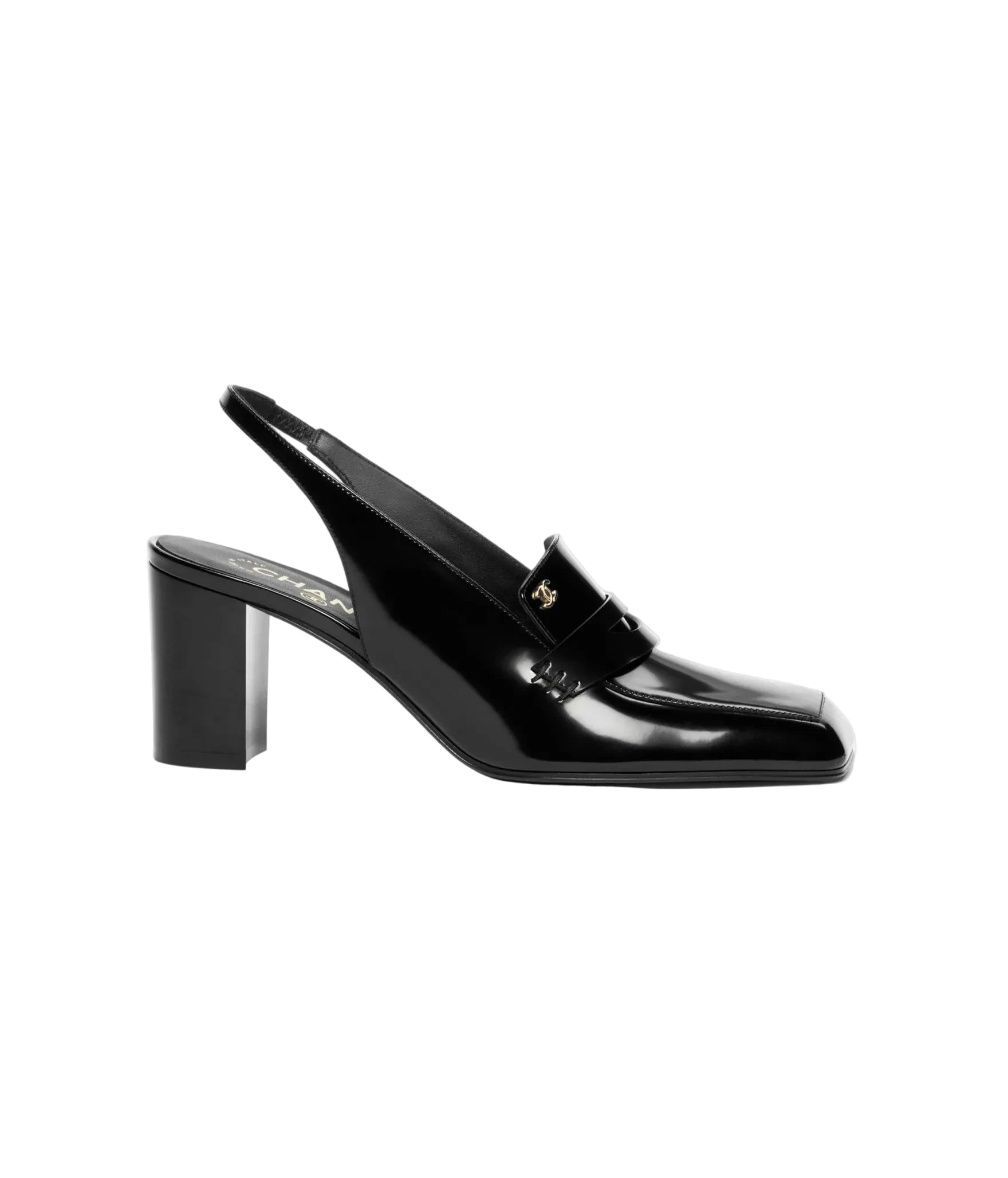 A single black patent leather slingback mule with a block heel and a small gold-tone monogram detail on the strap, shown in profile against a plain white background.