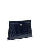 A navy blue crocodile-embossed leather clutch bag with a gold-tone interlocking CC logo on the front, set against a plain white background.