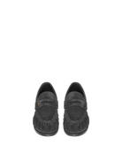 Pair of black loafers on a white background