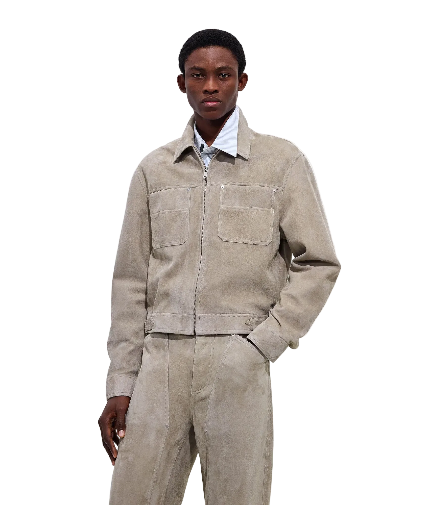 Man wearing a beige jacket and pants on a white background